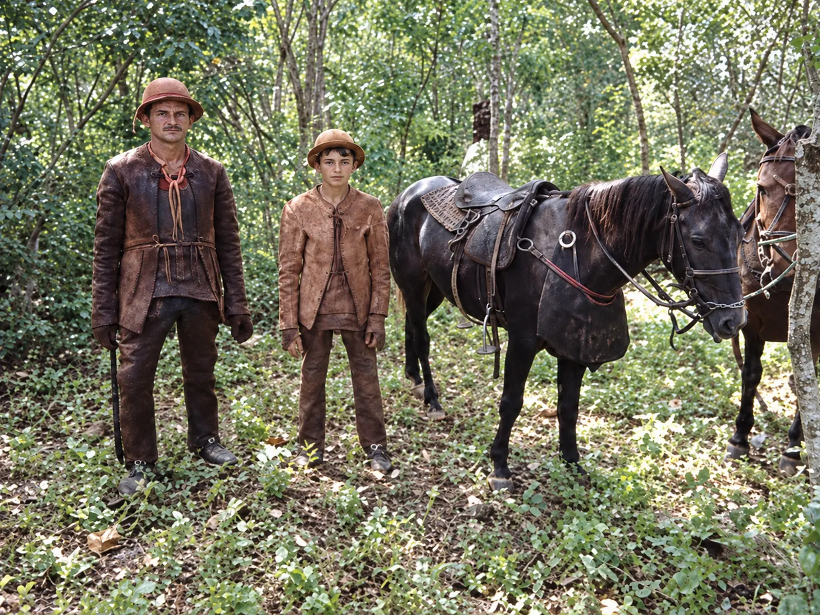 Vaqueiros e cavalos